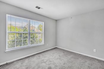Beige carpet in bedroom